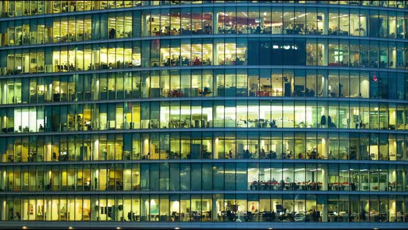 The exterior of an office block at night 