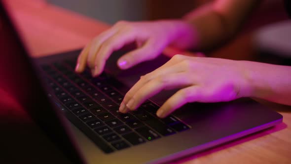 Woman Typing on PC Keyboard alt
