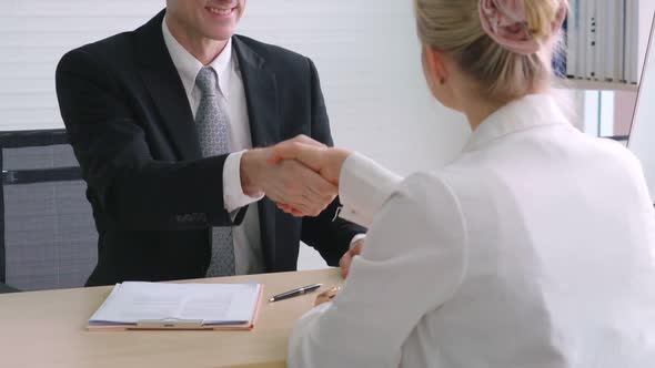 Job Seeker and Manager Handshake in Job Interview alt