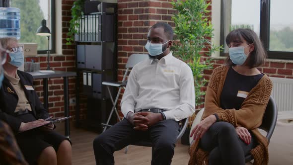 Woman Having Discussion with People About Addiction at Aa Group Meeting Therapy alt