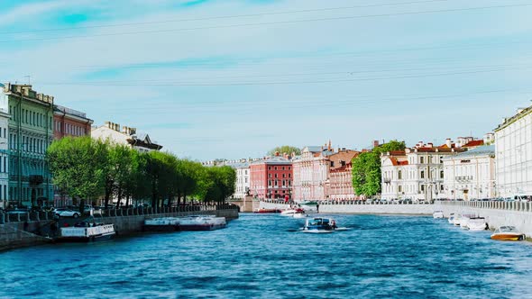 Touristic Boats Sail on Long River with Blue Water in City alt