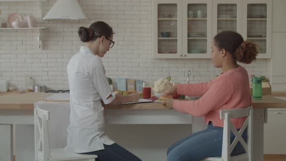 Nutritionist Forbidding Woman To Eat Junk Food alt