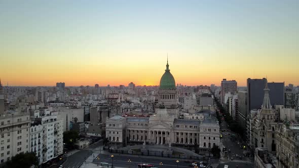 Aerial dolly in of Argentine Congress building with green bronze dome in Balvanera neighborhood at s alt