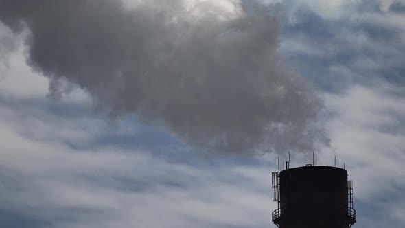 Smoke Comes From the Chimney. Air Pollution. Slow Motion. Ecology. Kyiv. Ukraine alt