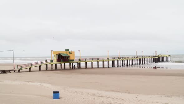 Pier and the Empty Beach in Villa Gesell, Buenos Aires province, Argentina. alt