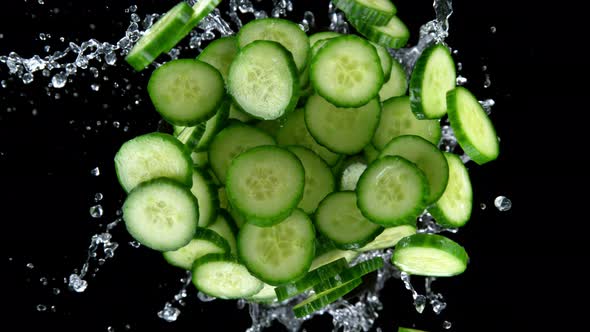 Super Slow Motion Shot of Rotating Exploded Cucumber Slices and ...