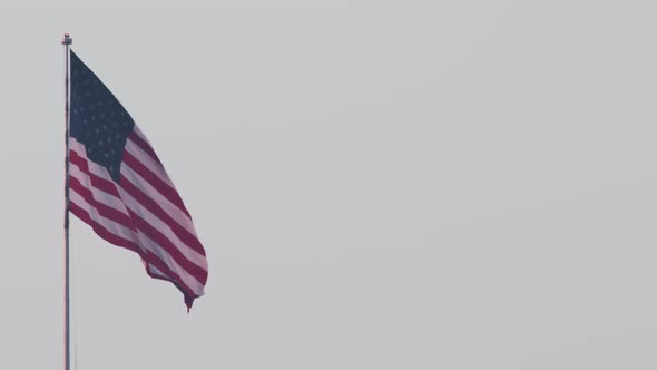 Distant View on Colorful Red and White Strips Pattern on Flattering on the Wind alt