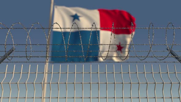Barbed Wire Against Waving Flag of Panama alt