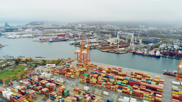 Aerial Panorama of Port with Ships, Containers and Cranes. Water Transport and Freight