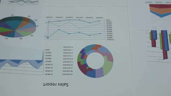 Business Chart Sales And Dollars On The Table alt