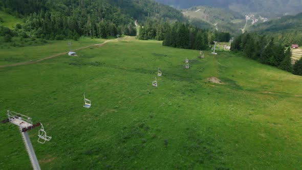 Aerial View of Chair Lift in Mountains Summertime alt