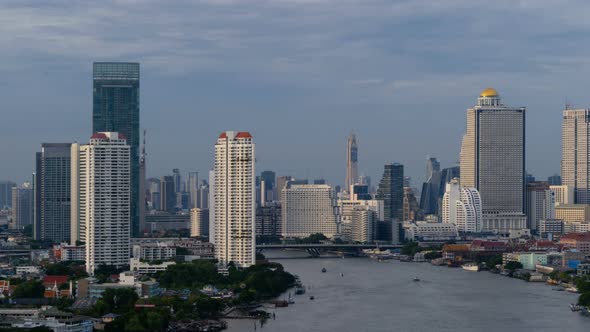 Time lapse of aerial view of boats and Taksin Bridge with Chao Phraya River, Bangkok  Thailand.