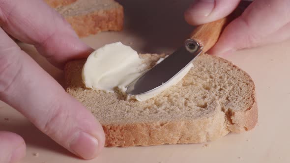 Butter Spreading on Bread Slow Mo Closeup