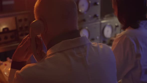 Operators working in the control room