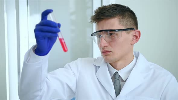 Lab Worker In White Coat