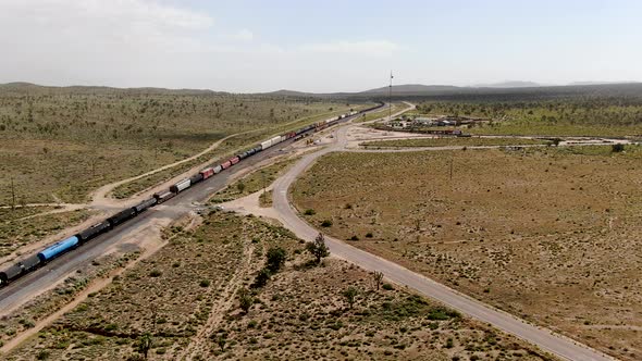 Cargo Locomotive Railroad Engine Crossing Arizona Desert Wilderness. USA alt