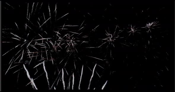 Old VHS effect of Spider white fireworks multiple explosions