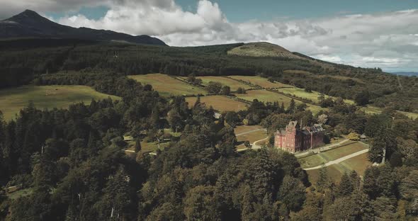 Scotland's Mountains Old Castle Aerial Panning Shot Designed Landscapes of Garden Parks Woods alt