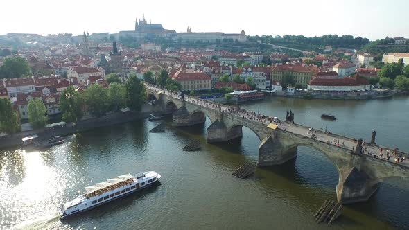 Aerial view of boats and Charles Bridge