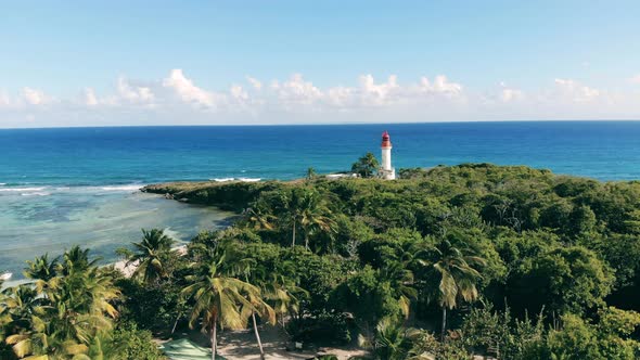 Island with Palms and a White Lighthouse alt