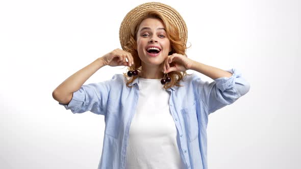 Happy Woman in Straw Summer Hat Having Fun with Fresh Ripe Sweet Cherry Berry Summer Accessory