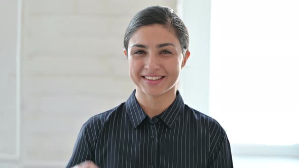 Beautiful Young Indian Woman Showing OK Sign  alt