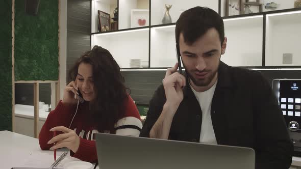 Colleagues at Work Discussing Plans Being in a Pleasant Cozy Atmosphere alt