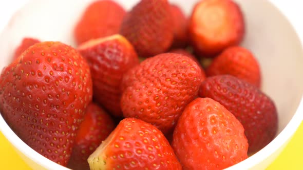 healthy and tasty strawberries in the bowl - close up alt