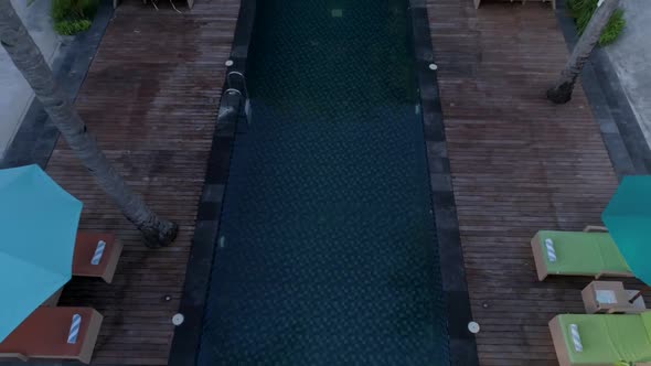 Aerial view of swimming pool between bungalow, Gili Trawangan island, Indonesia. alt