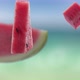 Flying of Watermelon and Slices in Blue Beach Background - VideoHive Item for Sale