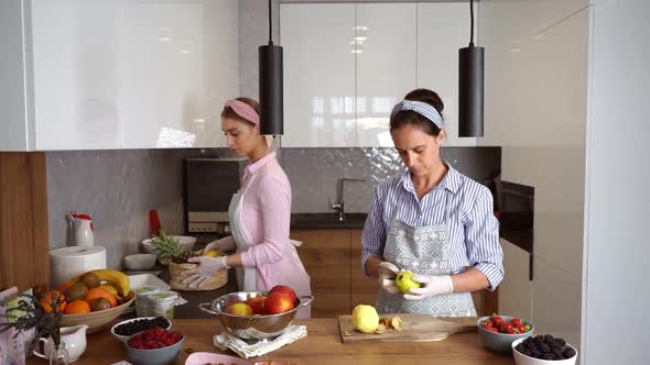 Women Cooking From Apples