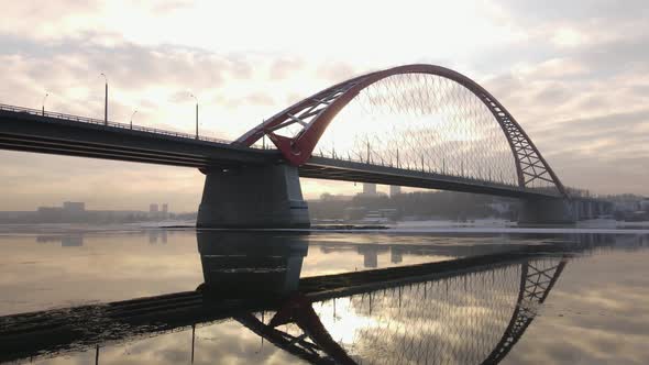 Bottom View of the Bugrinsky Bridge Against the Background of the Sunset Sky alt