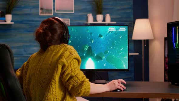 Professional Gamer Playing and Winning in Space Shooter Online Game alt