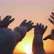 Silhouette of Reaching Helping Hand Hope and Support Each Other Over Sunset - VideoHive Item for Sale