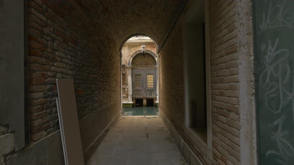 Narrow brick corridor 