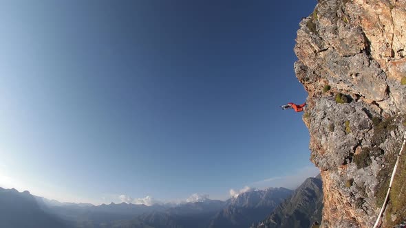 Extreme Parachute Jump From the Top of the Mountain. Base Jumping, Slow Motion
