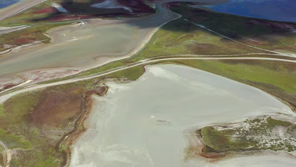 Beautiful flight in summer over salt lakes. Dry lakes. Green grass. alt