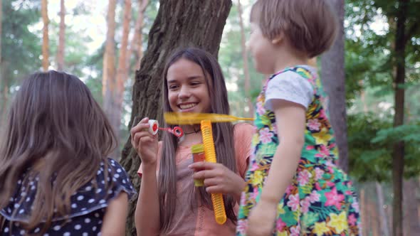 Beauty Girl Blowing Bubbles Soap Kids Communication Child Friends Playing Outside alt