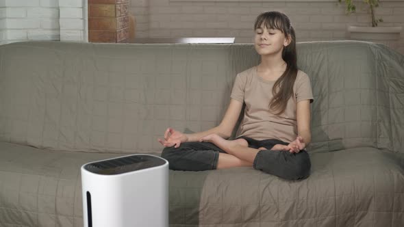 Girl Breath Fresh Air By Humidifier alt