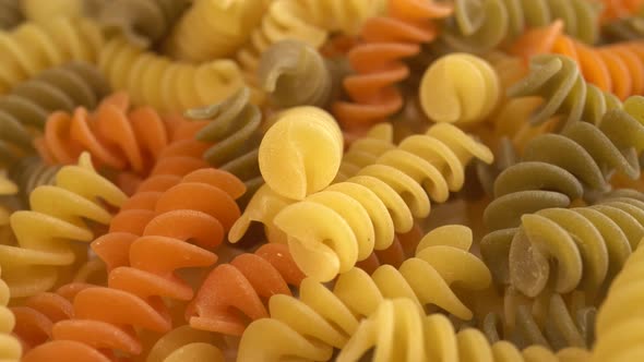 Rotation Background Of Tricolor Fusilli Pasta alt