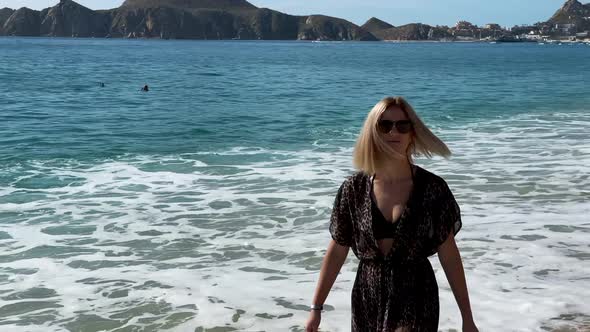 Walking Barefoot Along Golden Sand Beach alt