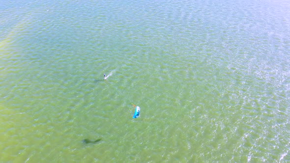 Aerial view of kitesurfing on a hydrofoil board, Queensland, Australia. alt