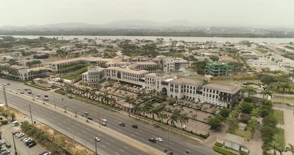 Aerial view zoom out Plaza Lagos Town Center Guayaquil City Ecuador alt