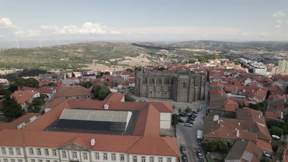 Drone view reveals layout of Guarda city surrounding the Guarda Cathedral