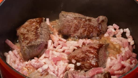 Preparation of traditional burgundy beef with red Burgundy wine alt