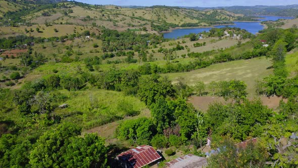 Rural farm community on banks of Bao dam, Santiago, Dominican Republic alt