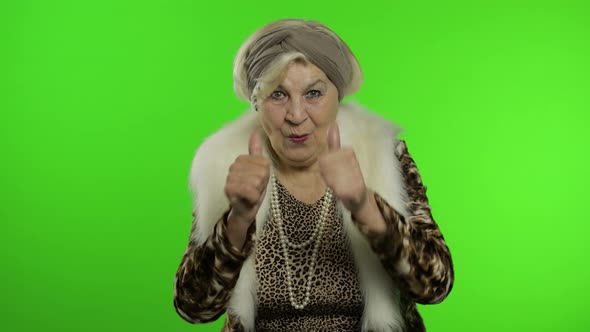 Elderly Stylish Grandmother. Caucasian Woman Claps Her Hands. Chroma Key alt
