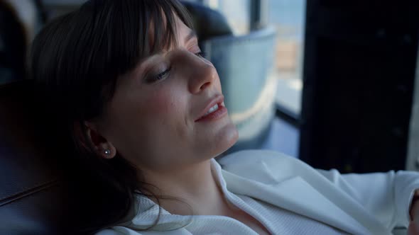 Dreamy Woman Face Relaxing Office Armchair Closeup alt