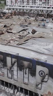 Vertical Video of a Bombed Shopping Center During the War in Bucha Ukraine alt