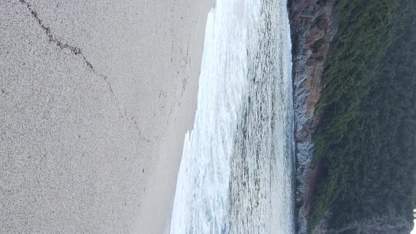 Vertical Video Sea Near the Coast  Closeup of the Coastal Seascape alt